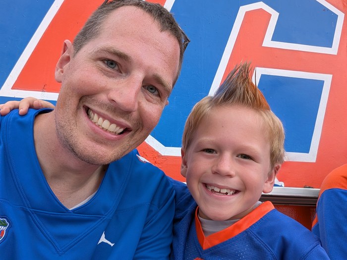 Dr. Graham and his son at a University of Florida Gators football game